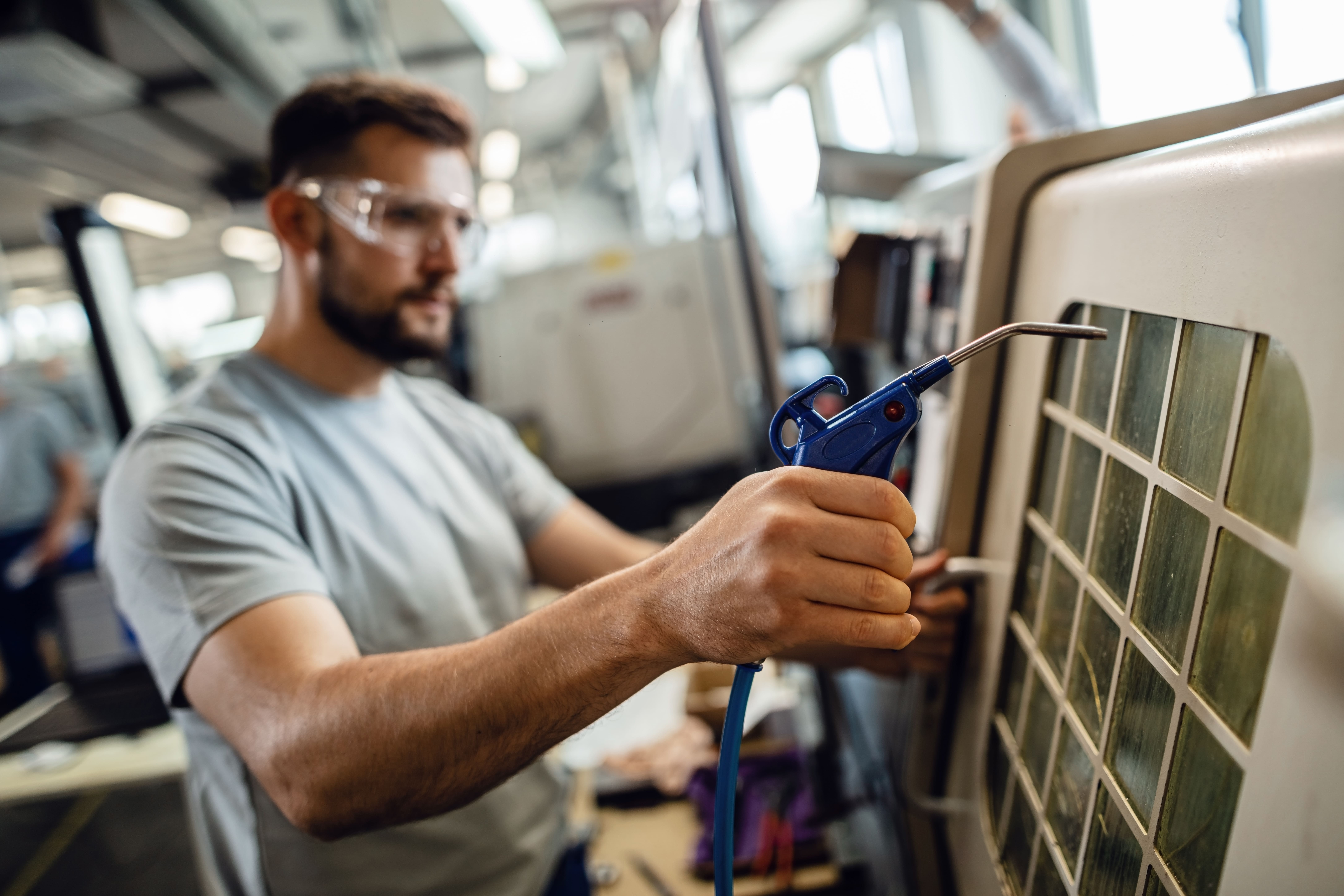 VennAIR technician working with care on an AC unit